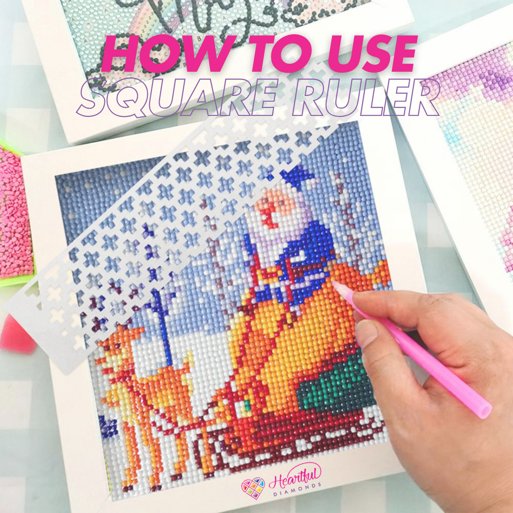 diamond painting using a square ruler on a santa clause canvas